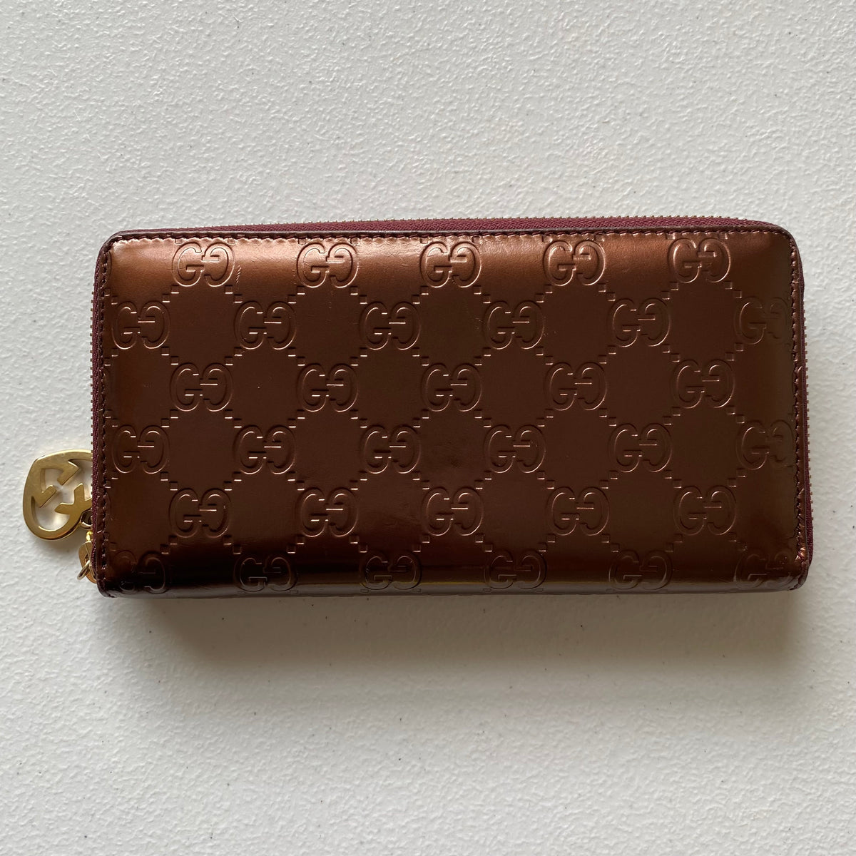 Gucci monogram guccissima burgundy leather zip around wallet Authentic with COA 7.5x4