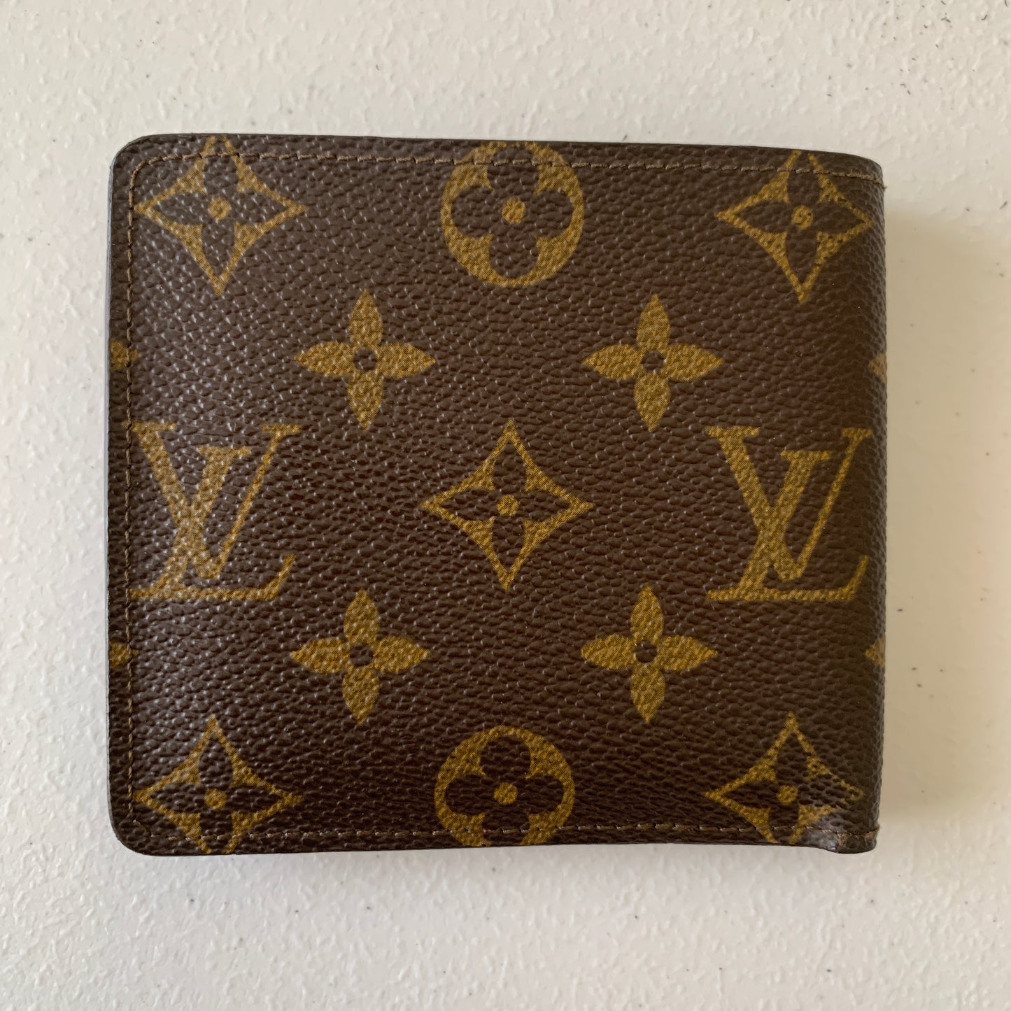 Louis Vuitton monogram men’s bifold Wallet RA950 authentic w/ COA