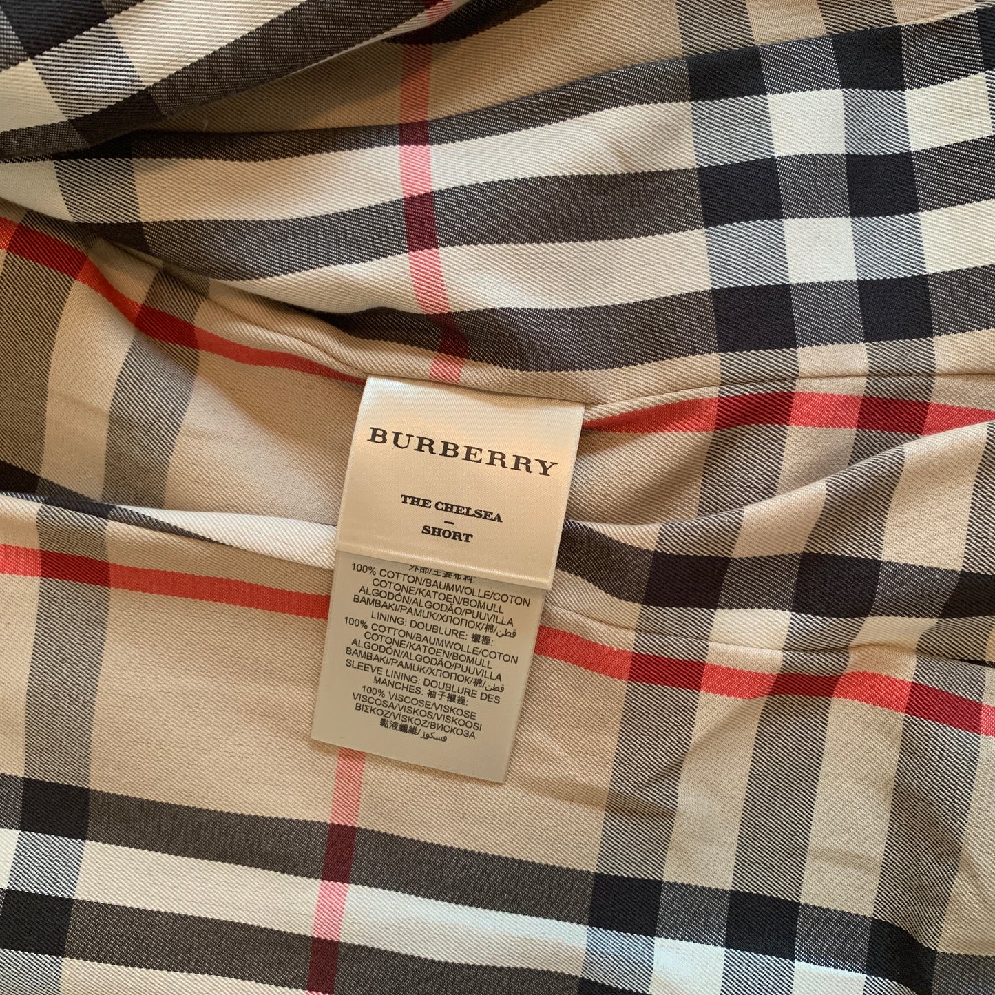 Authentic Burberry women’s trench coat never worn