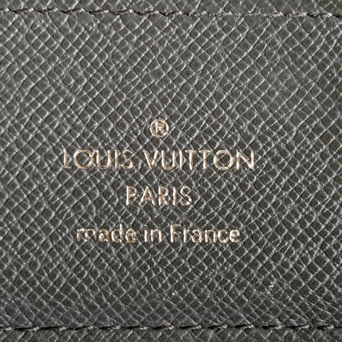 Louis Vuitton taiga men’s bifold leather wallet SP4152 authentic with COA