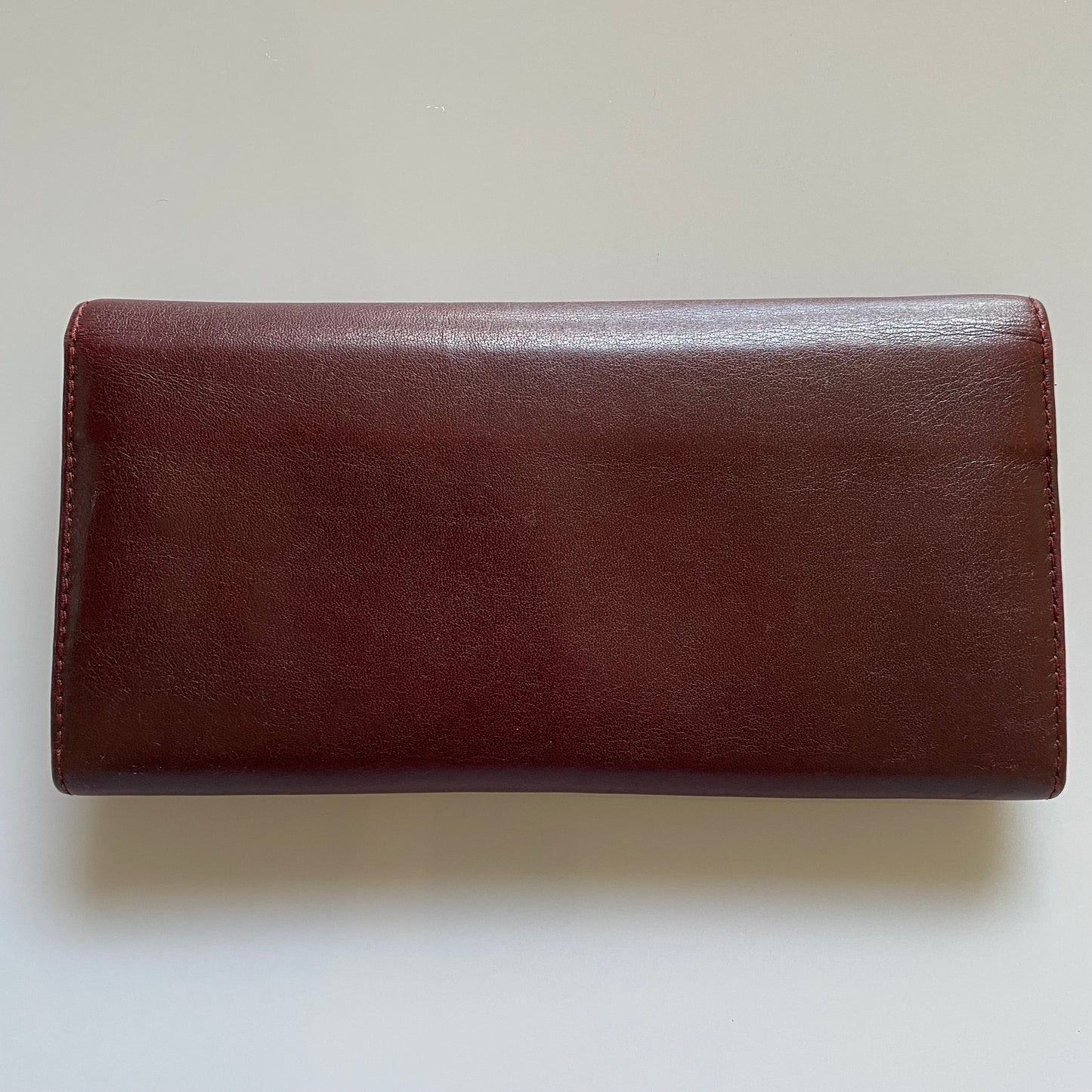 Ferragamo burgundy leather long wallet Authentic with coa