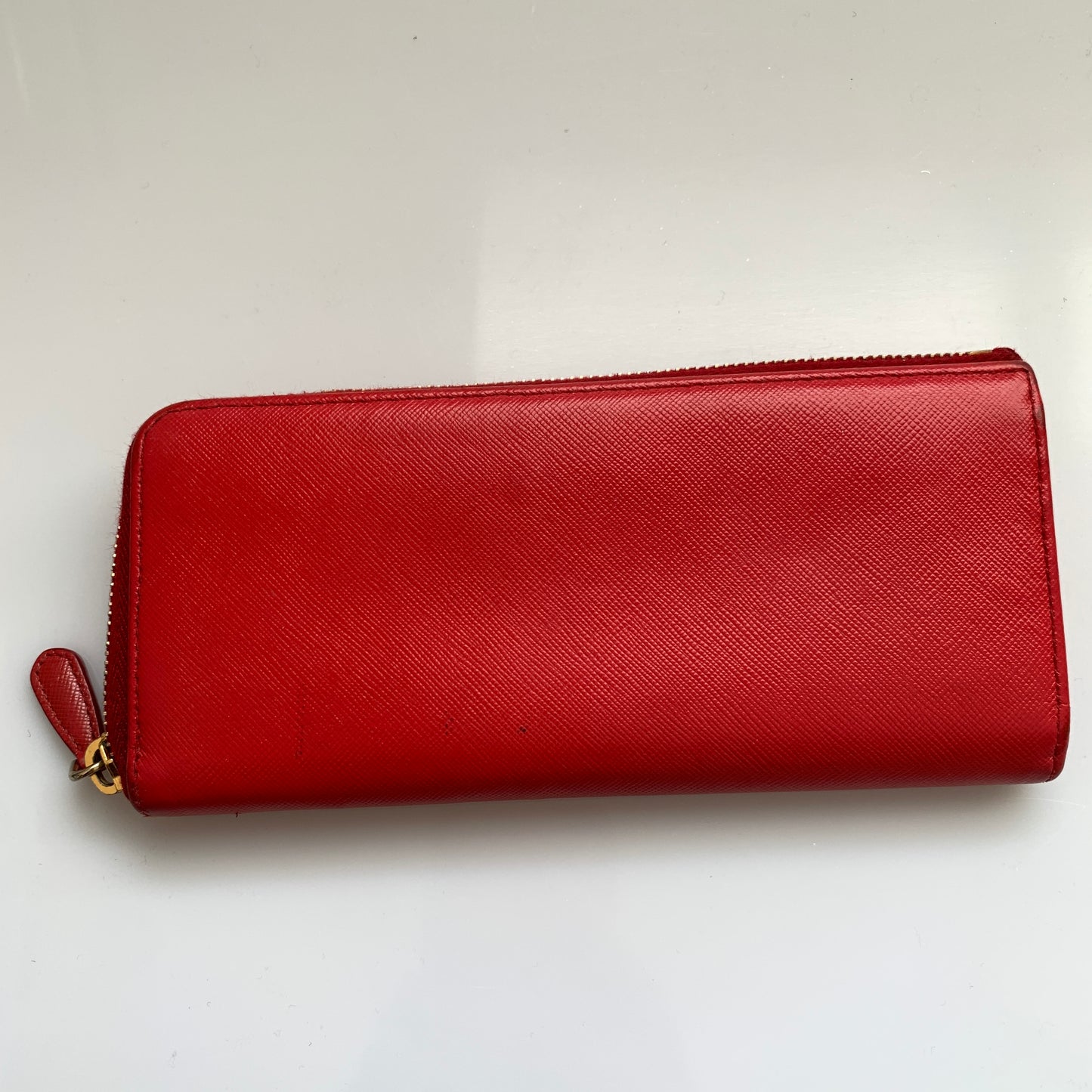 Prada women’s red long zip around wallet Authentic of COA