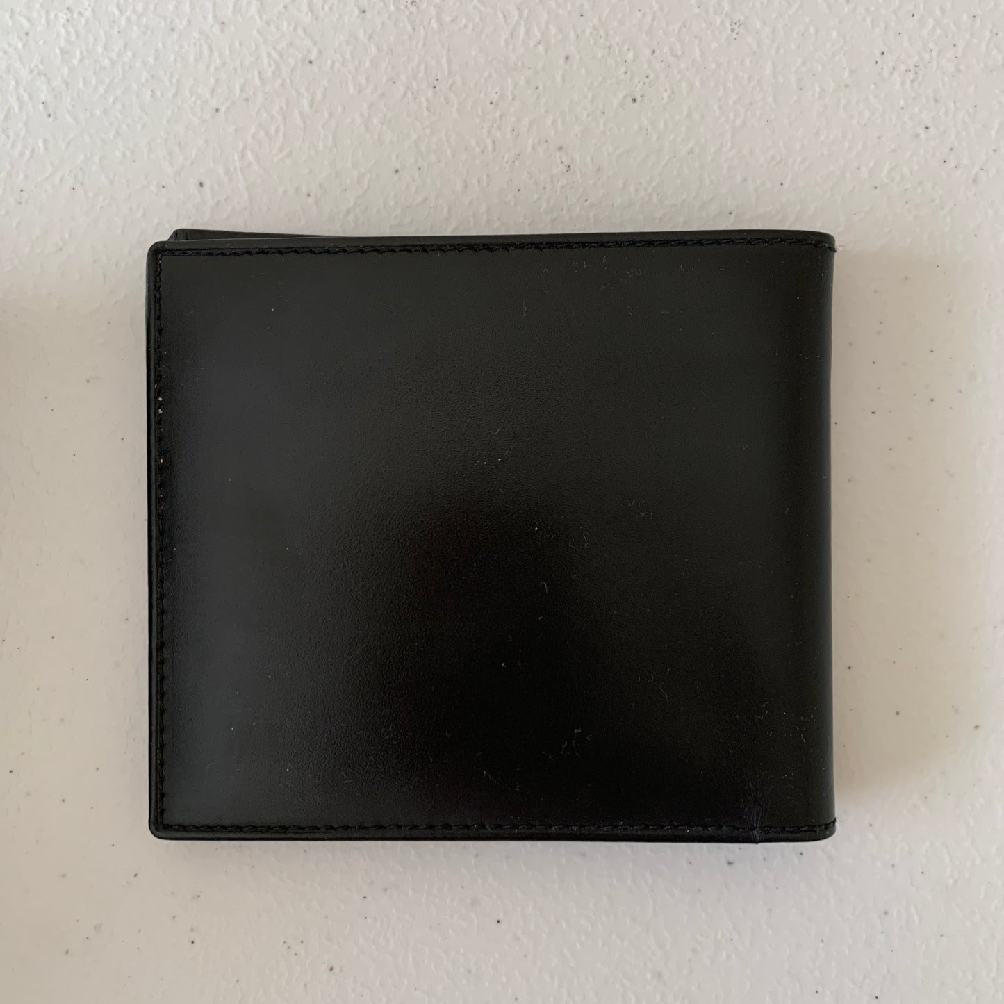 Christian Dior CD logo Men’s bifold wallet black leather Authentic with COA