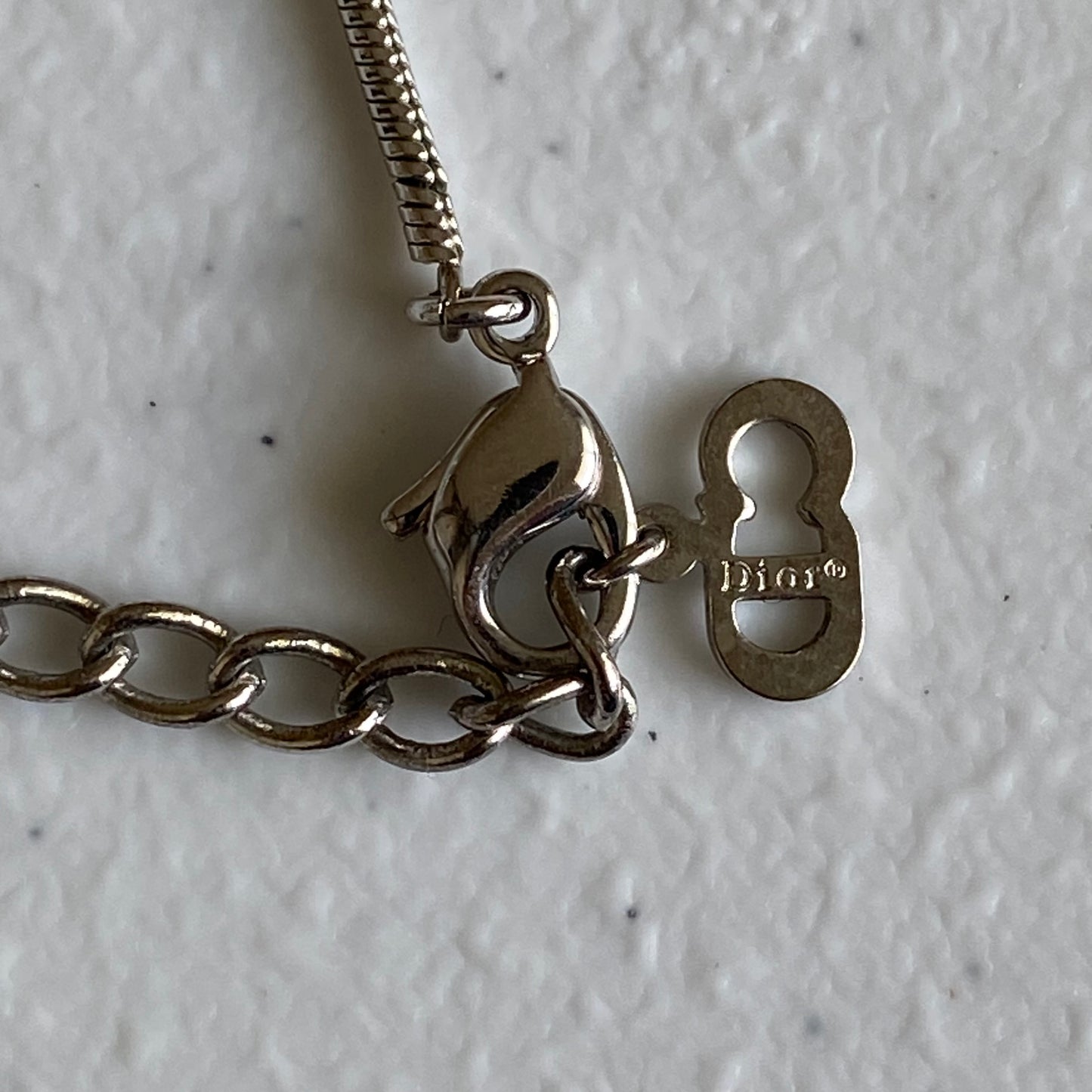 Dior silver tone logo plate pendant necklace Authentic with COA