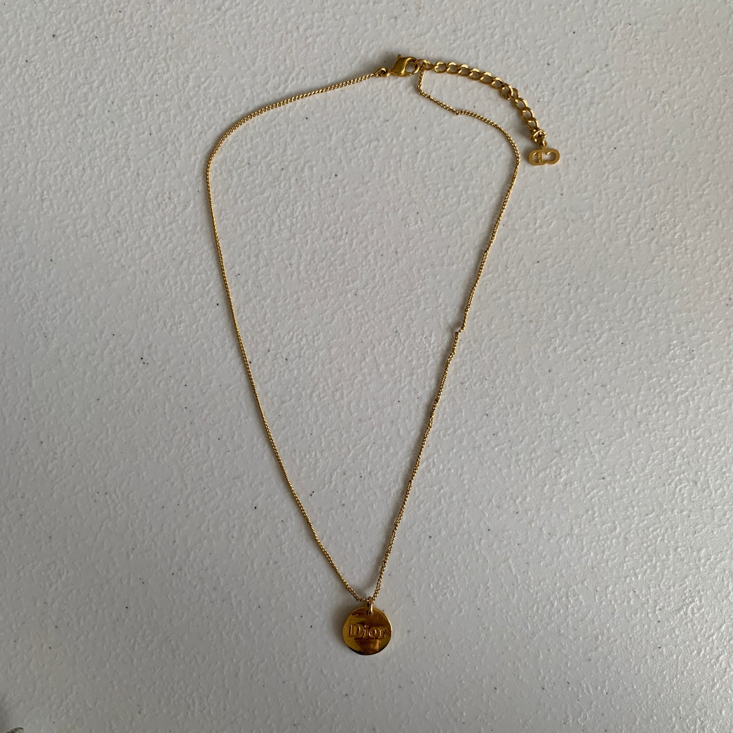 Christian Dior logo round pendant gold plated necklace authentic with COA