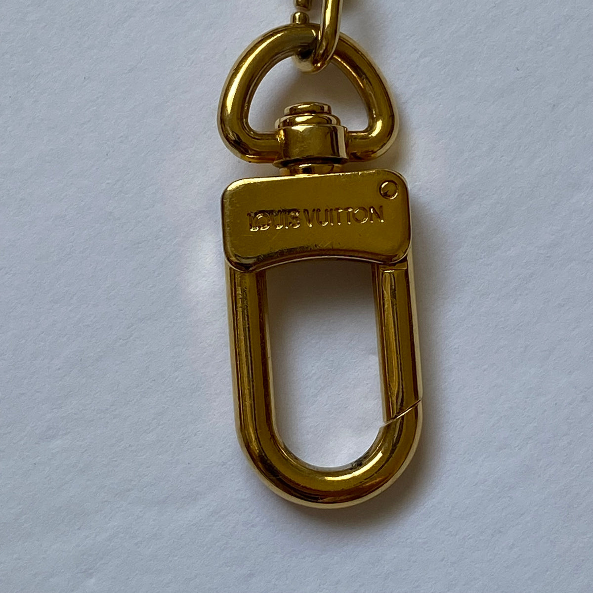 Louis Vuitton gold tone key ring  holder Authentic with COA 3 inch