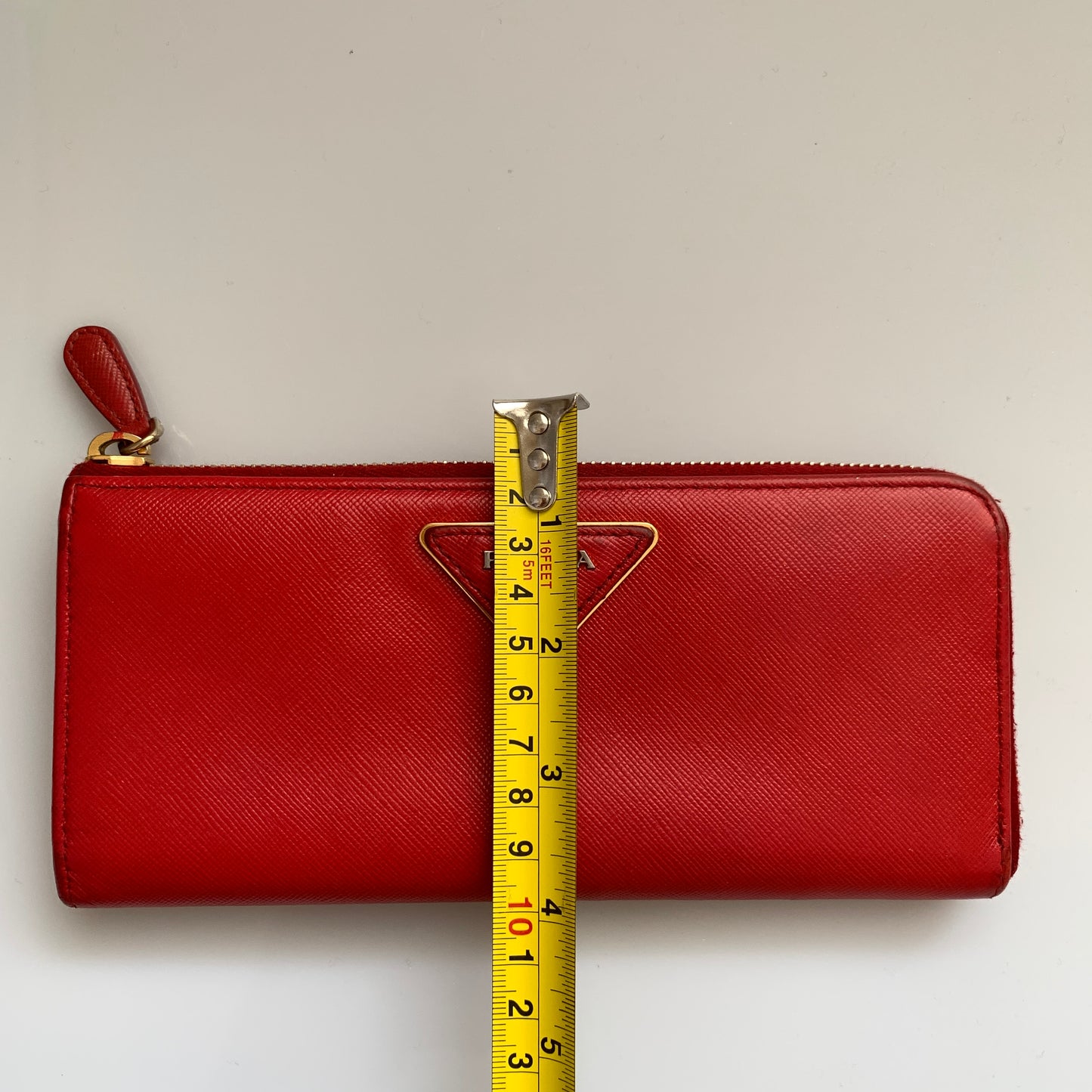 Prada women’s red long zip around wallet Authentic of COA