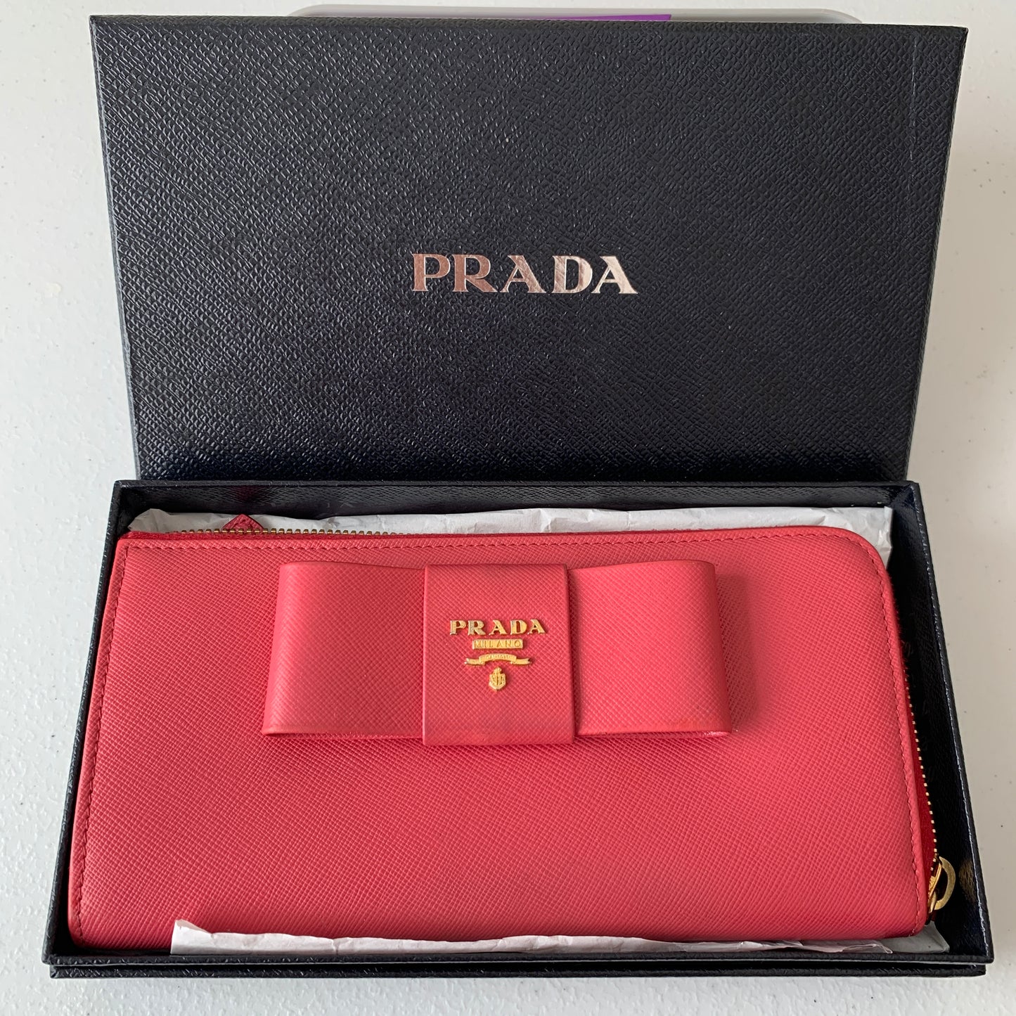Prada fiocco bow pink saffiano leather zip around Wallet authentic with COA and