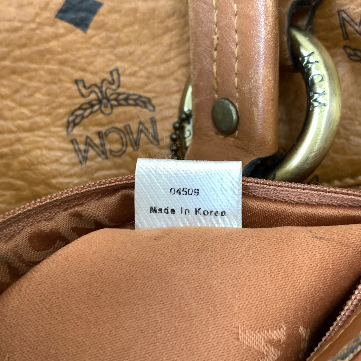 MCM cognac visetos barrel shoulder bag Authentic with COA
