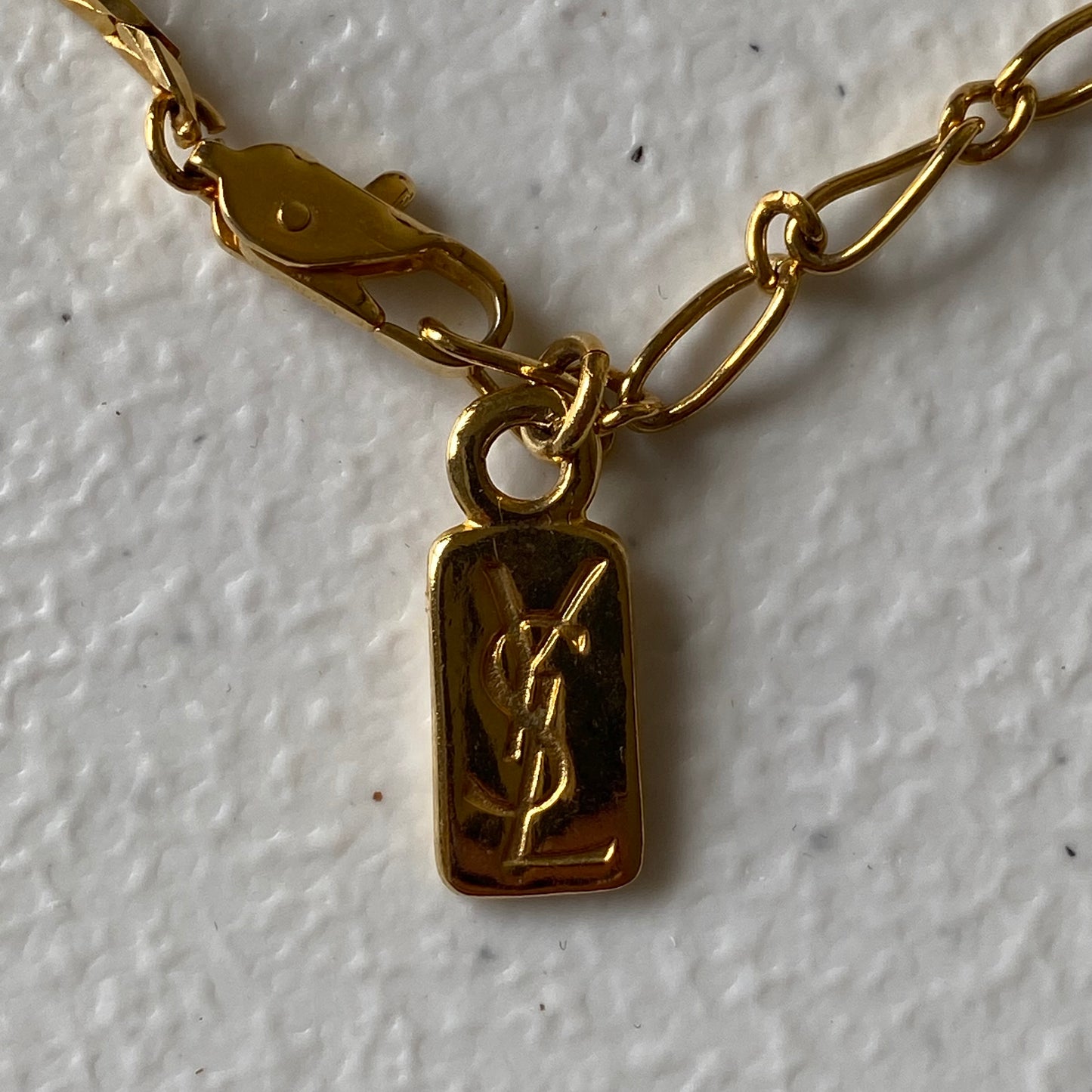 Yves Saint Laurent YSL logo 1 inch pendant gold plated adjustable necklace Authentic with COA