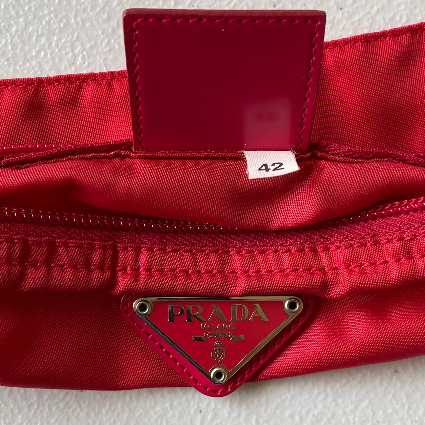 Prada triangle logo red pouch authentic with COA