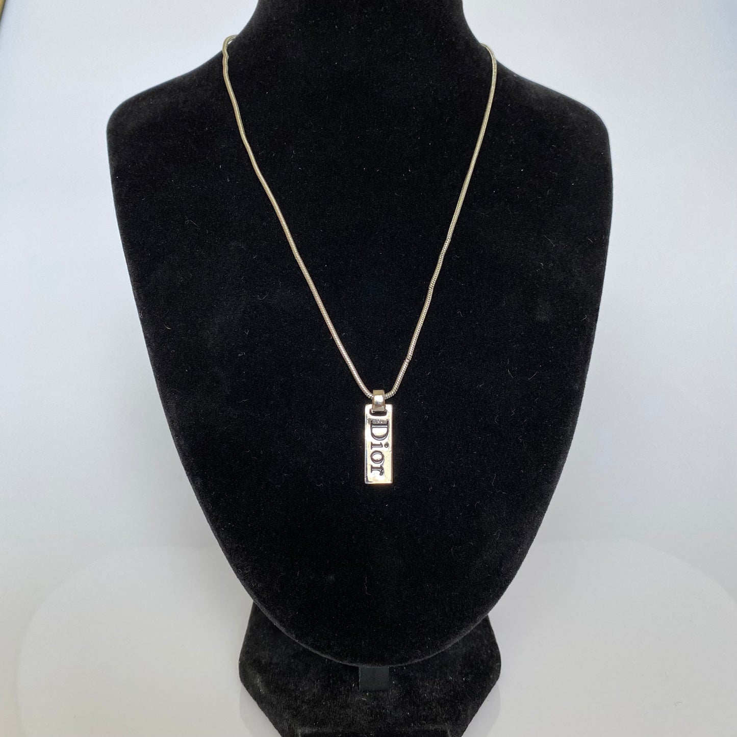 Dior silver tone logo plate pendant necklace Authentic with COA