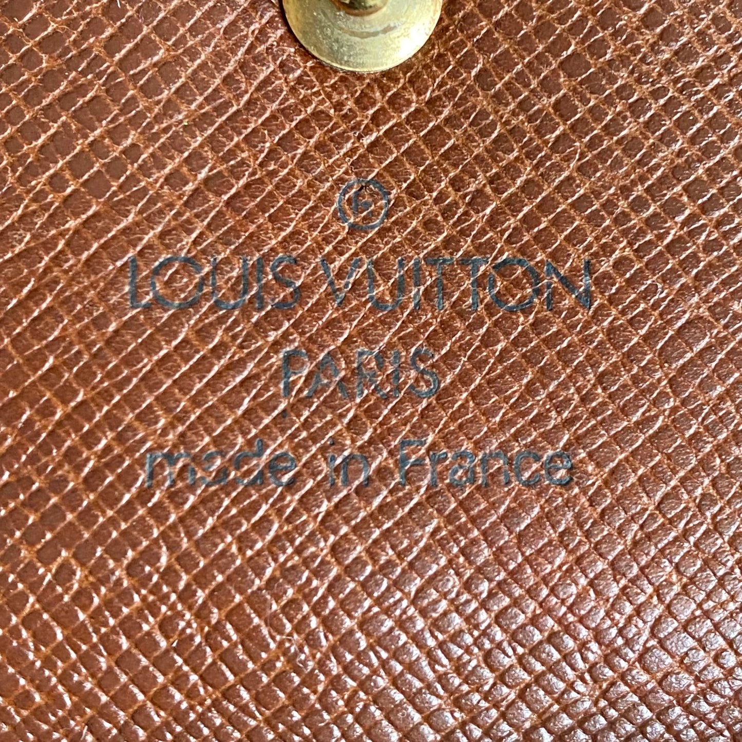 Louis Vuitton unisex monogram trifold wallet th0995 authentic with coa