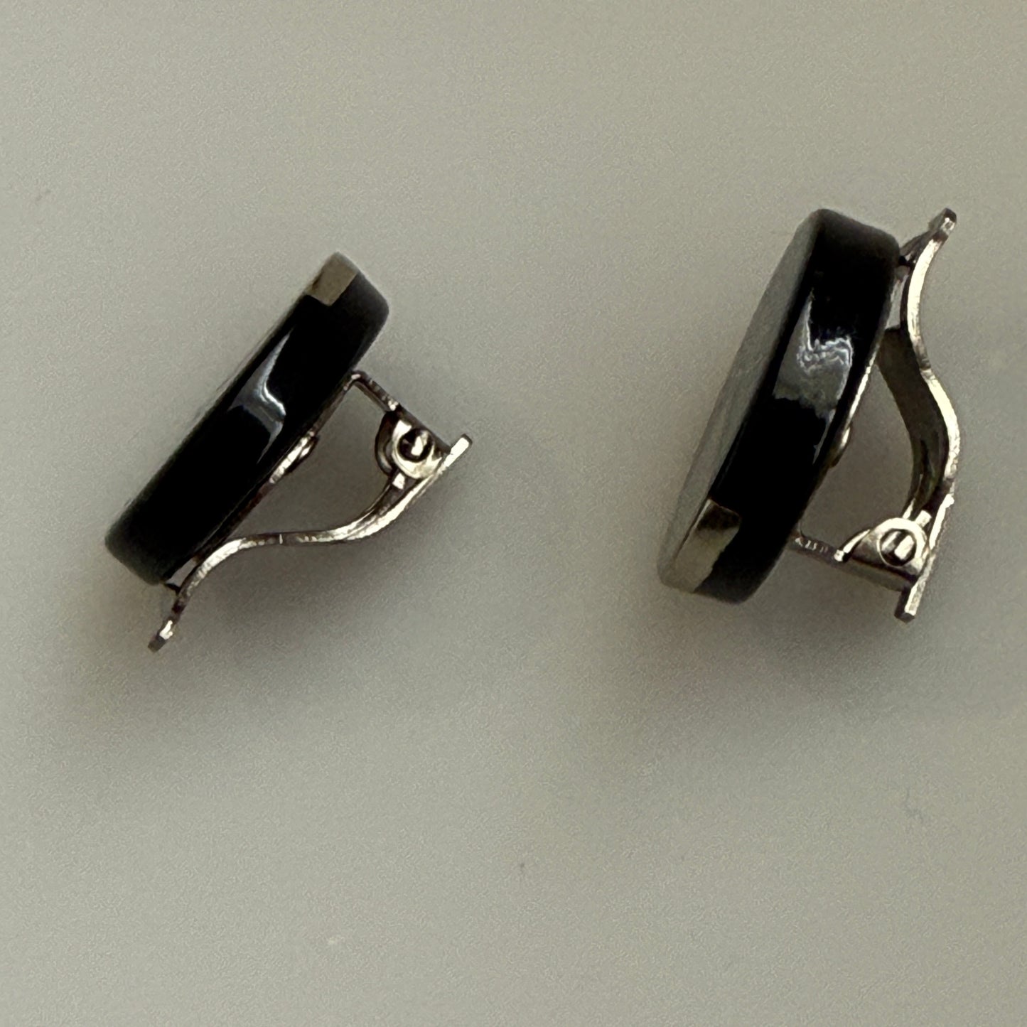 Chanel vintage black and silver logo clip on earrings authentic with COA