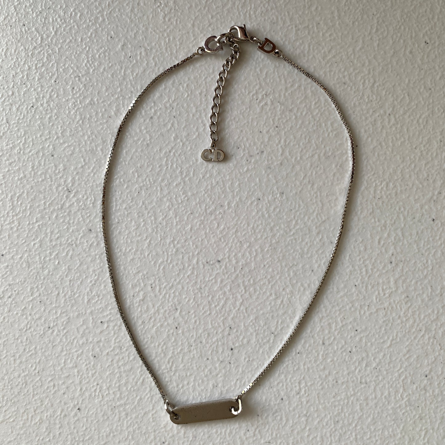 Dior silver tone logo plate adjustable necklace Authentic with COA