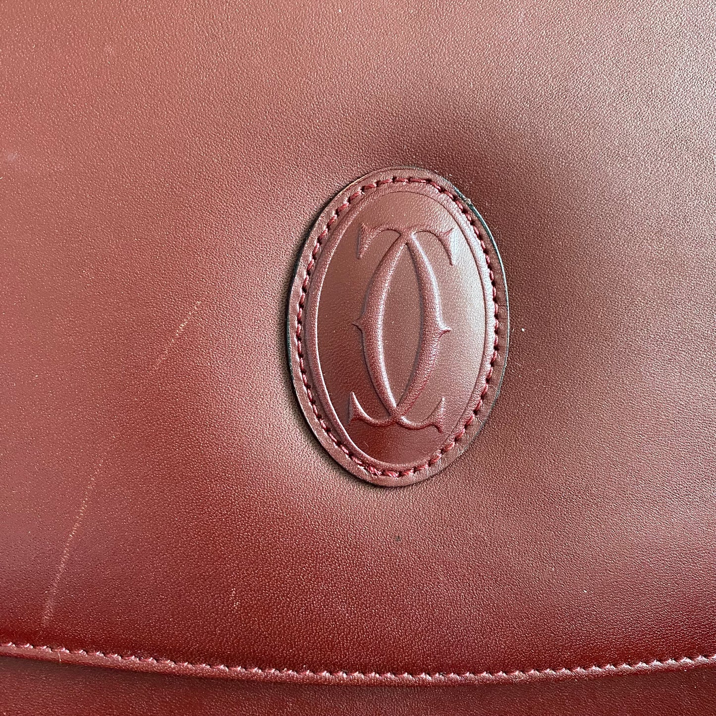 Cartier burgundy leather adjustable shoulder handbag Authentic with coa