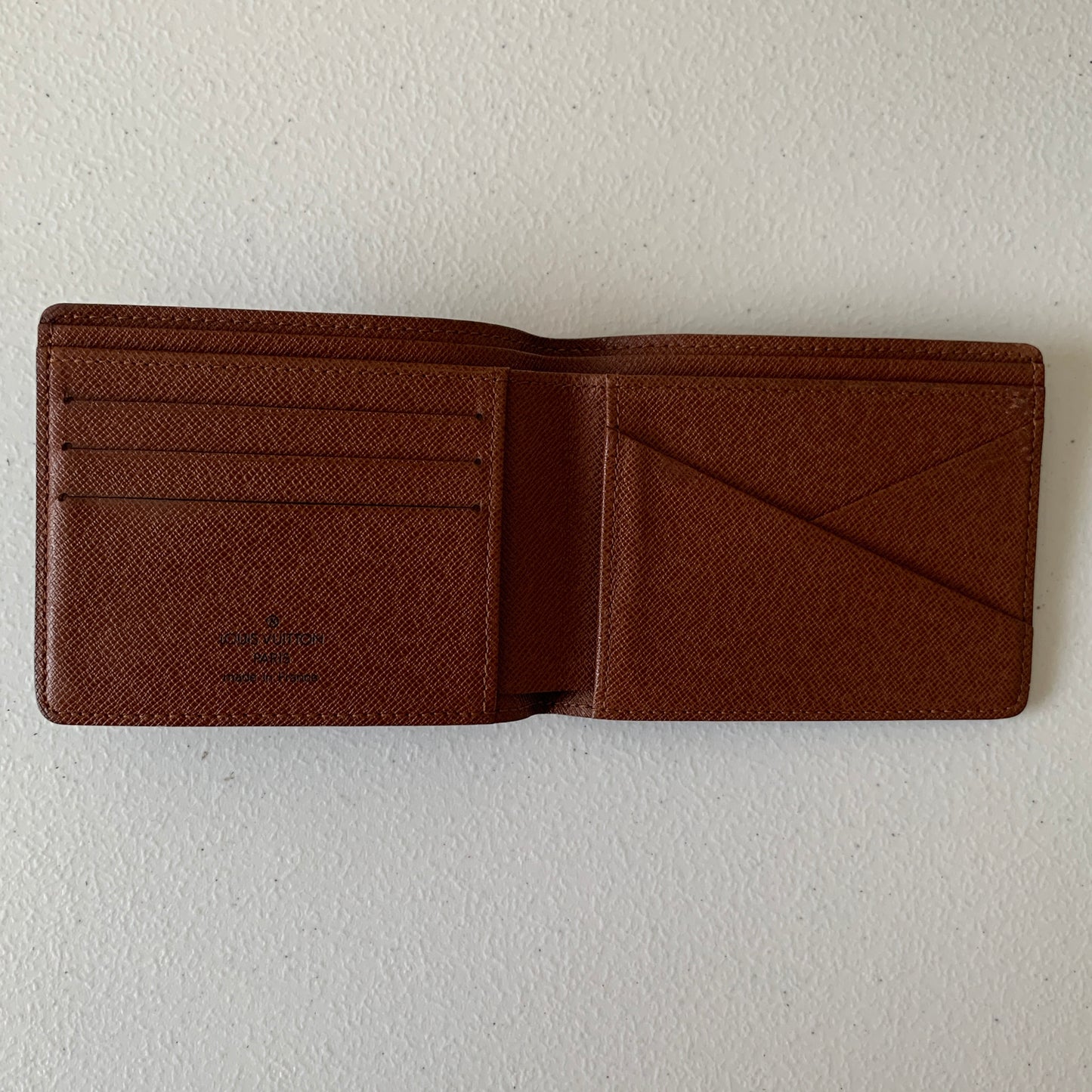 Louis Vuitton monogram men’s bifold Wallet RA2057 authentic with COA