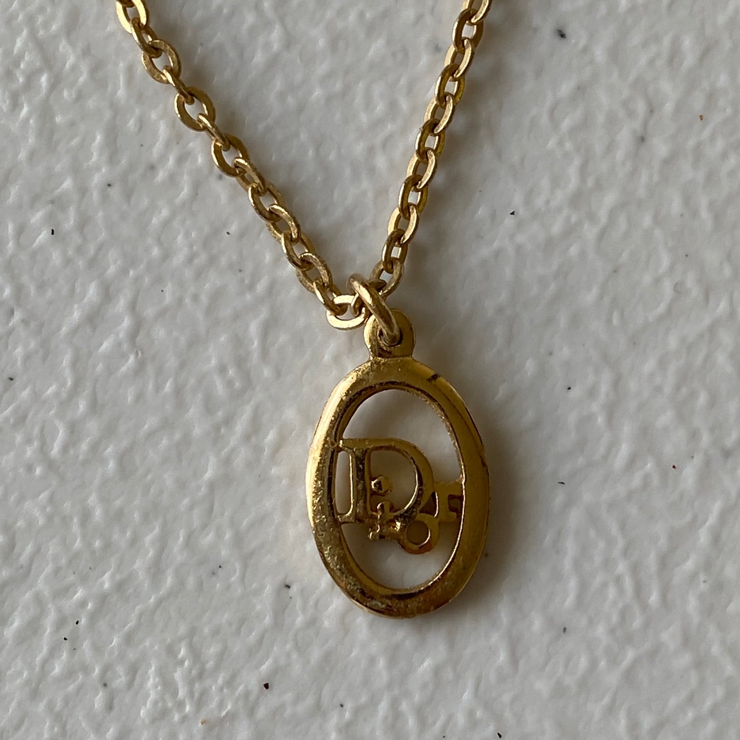 Dior CD logo pendant gold plated adjustable necklace Authentic with coa