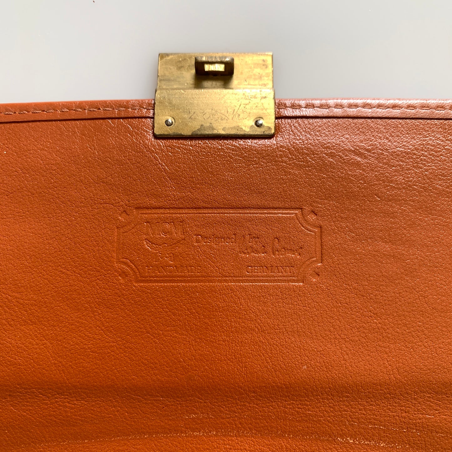 MCM cognac visetos unisex clutch bag with flap Authentic with COA
