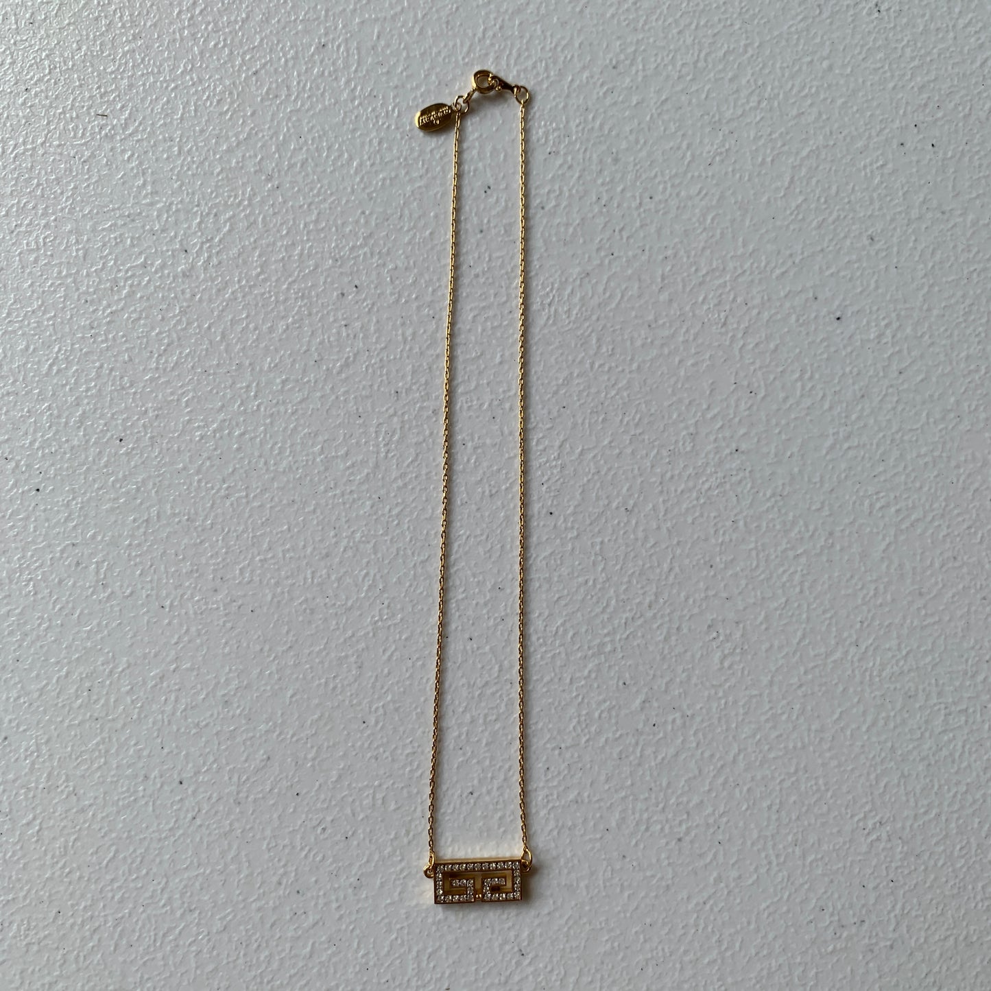 Givenchy gold plated logo pendant necklace Authentic with COA