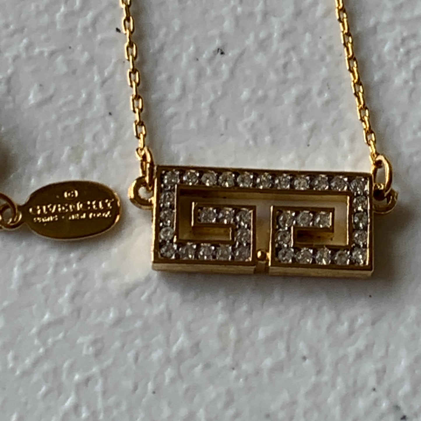 Givenchy gold plated logo pendant necklace Authentic with COA