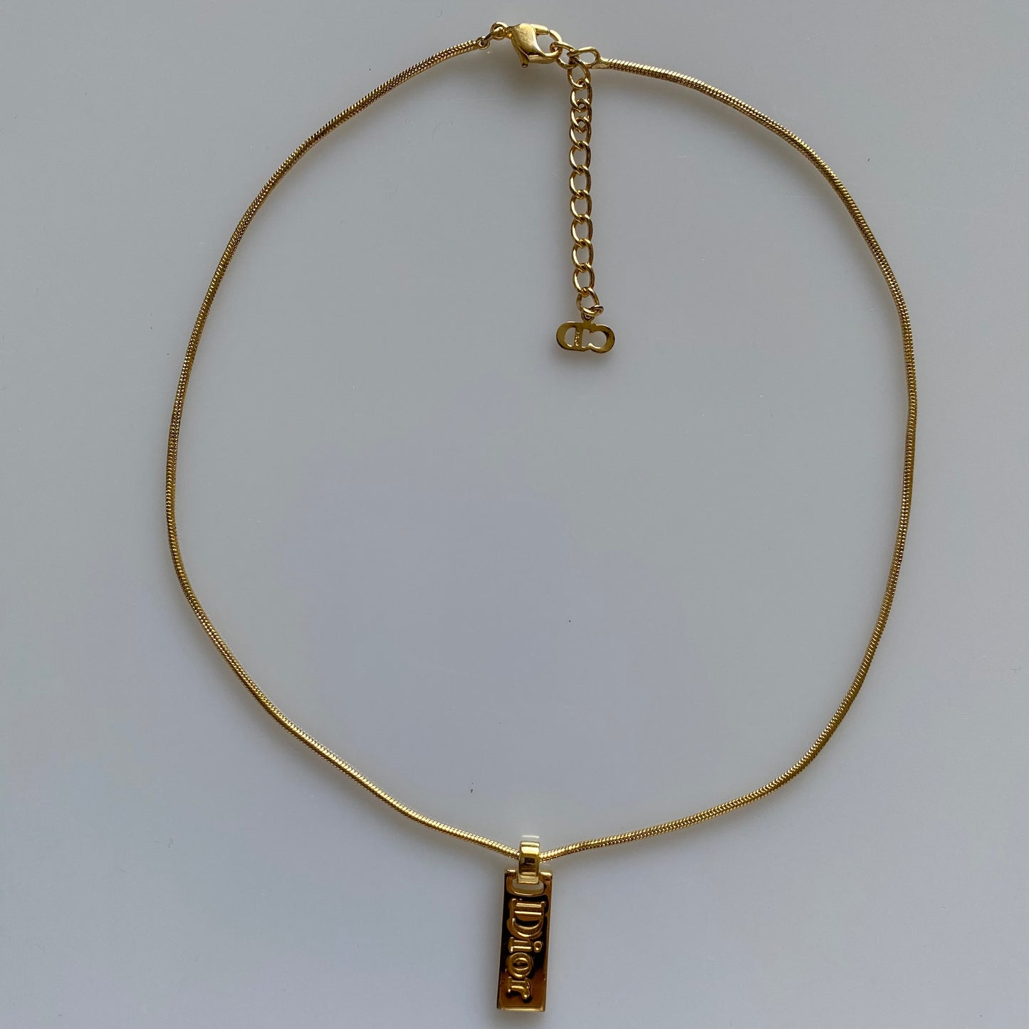 Dior logo plate pendant gold plated adjustable necklace Authentic with COA