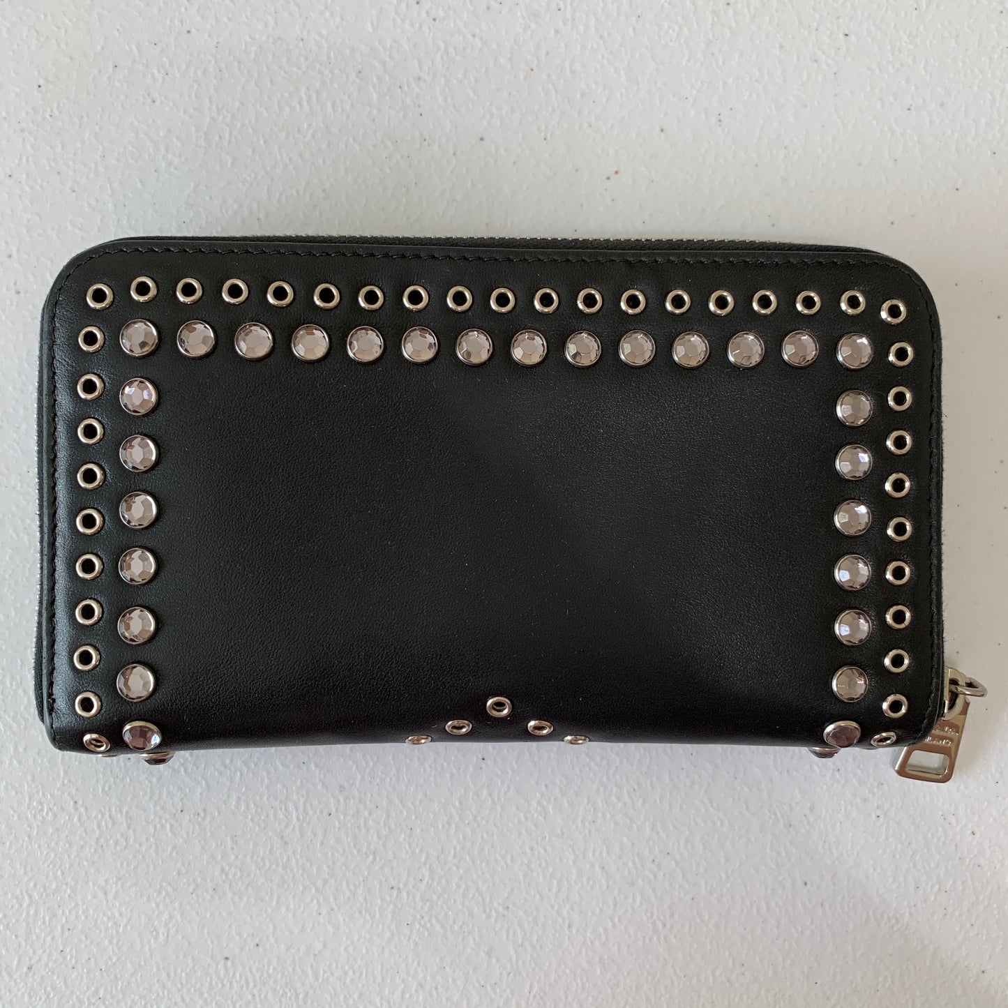 Prada black leather studded zipper wallet authentic with COA 4.5x7.5”