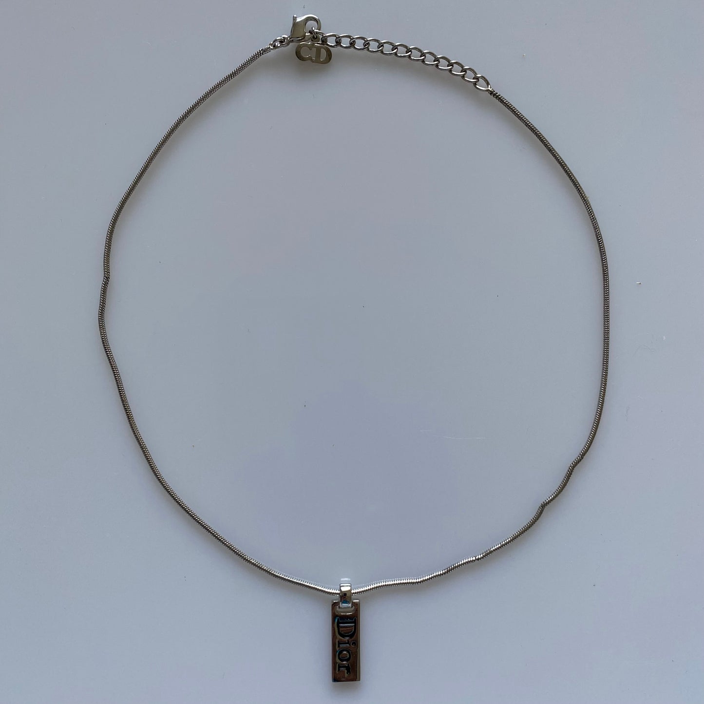 Dior silver tone logo plate pendant necklace Authentic with COA