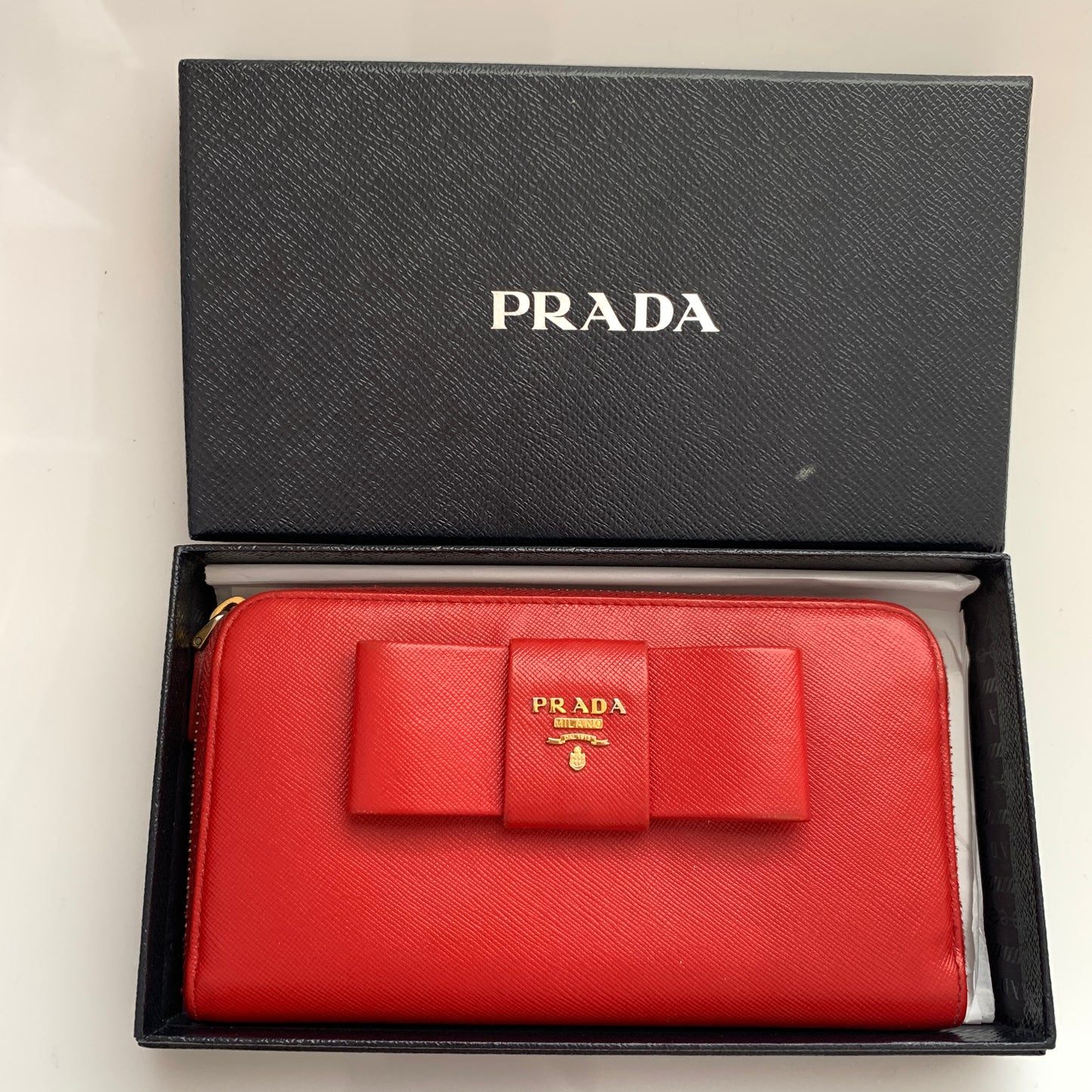 Prada women’s red leather long zip around wallet Authentic with COA
