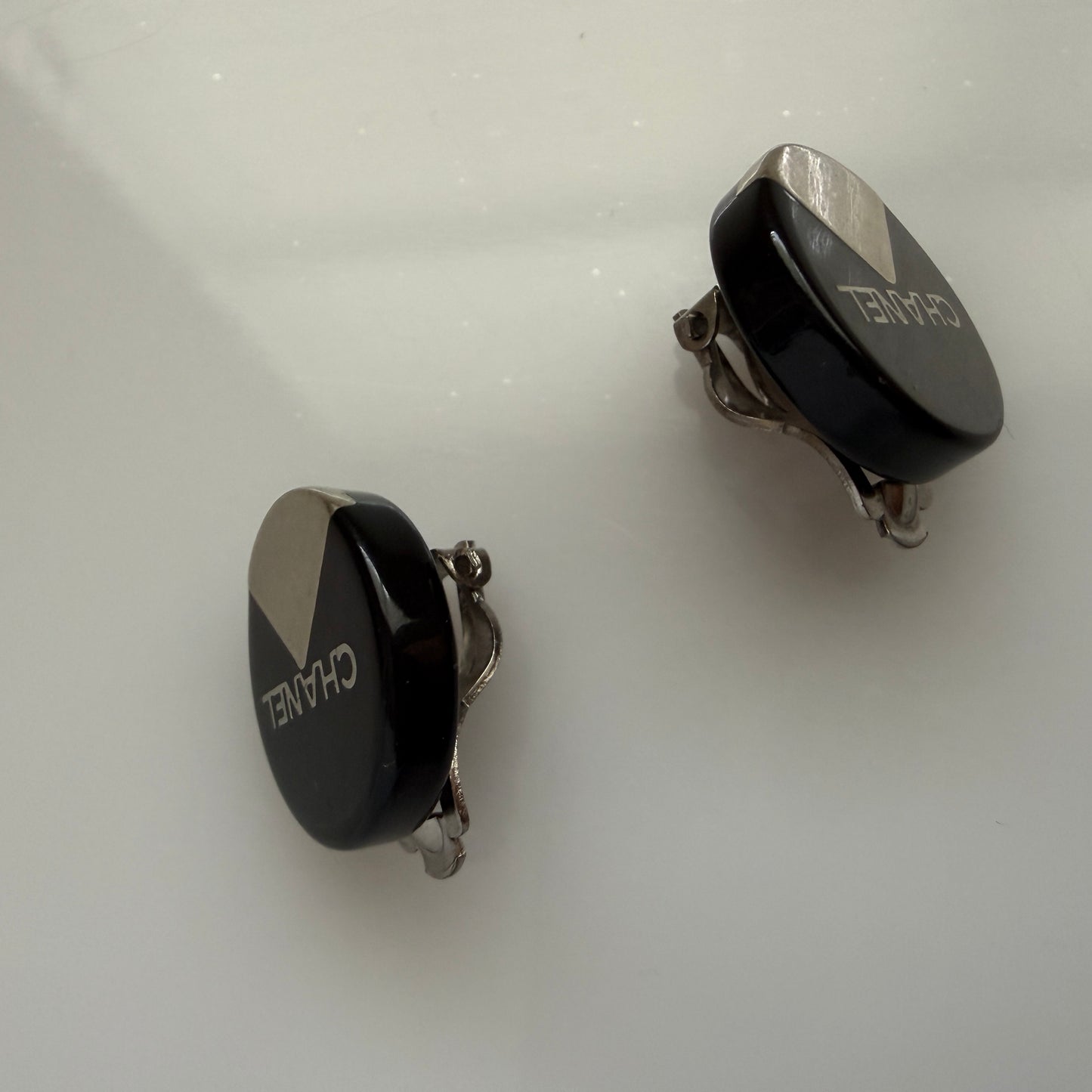 Chanel vintage black and silver logo clip on earrings authentic with COA